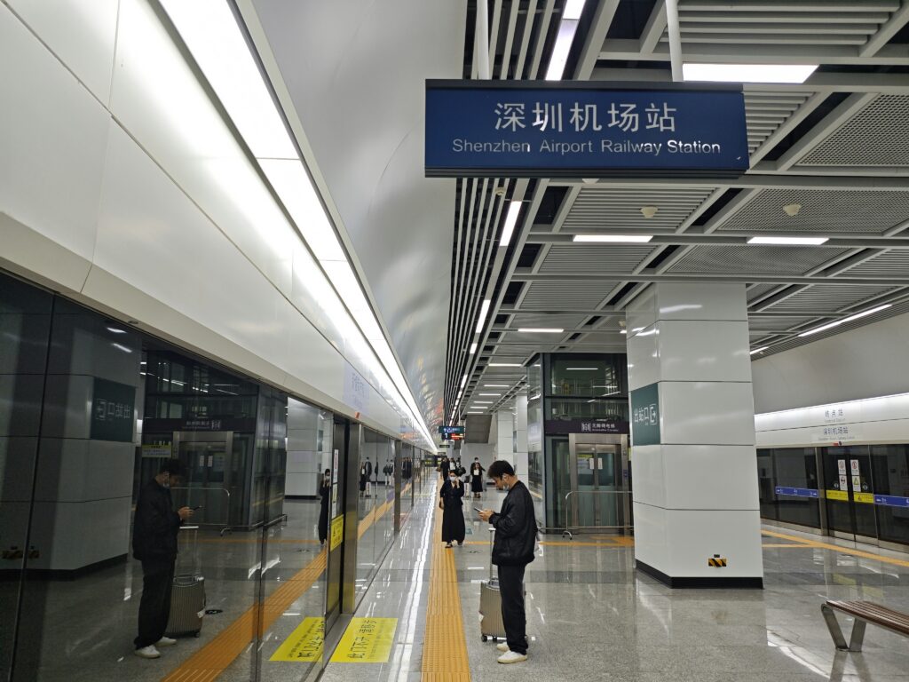 Shenzhen airport railway station platform with people waiting